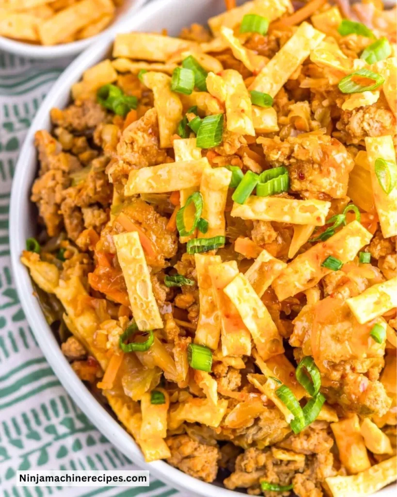 Delicious Crockpot Egg Roll in a Bowl served in a bowl with colorful vegetables