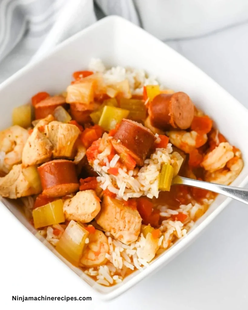 Delicious Crockpot Jambalaya cooked with rice, sausage, shrimp, and spices