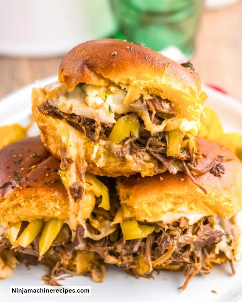 Delicious crockpot pot roast sliders served on a platter