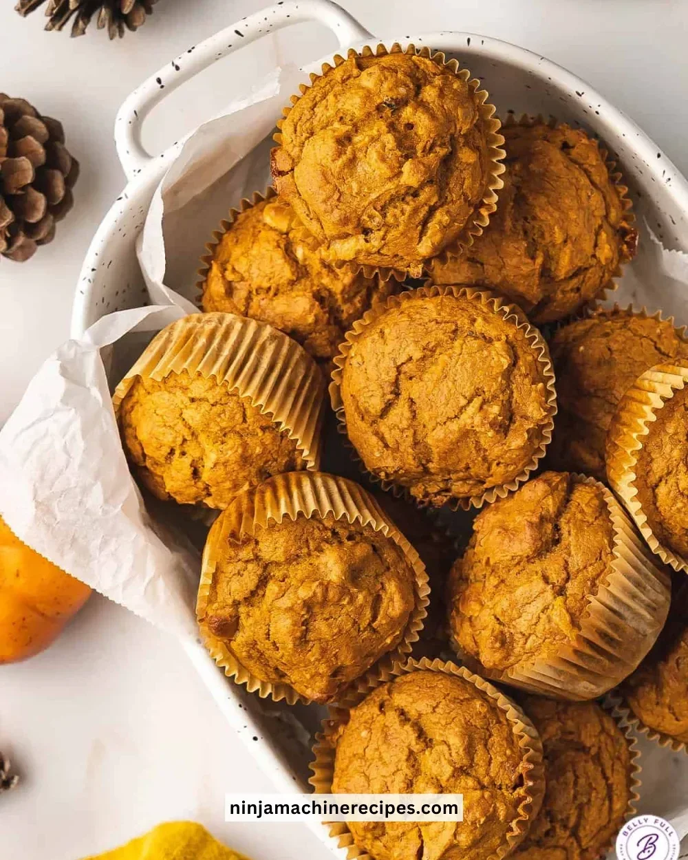 Delicious 4 ingredient pumpkin spice muffins fresh out of the oven