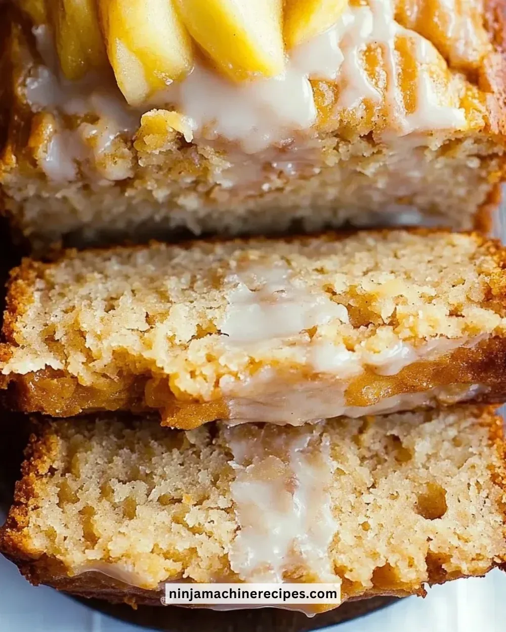 Delicious homemade Apple Bread displayed on a rustic wooden table