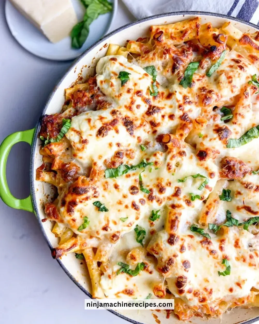 Delicious Baked Ziti with Italian Sausage served in a casserole dish.