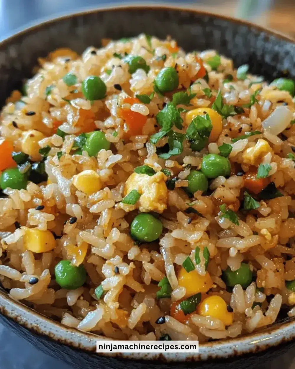 A colorful plate of easy veggie fried rice with mixed vegetables and herbs.