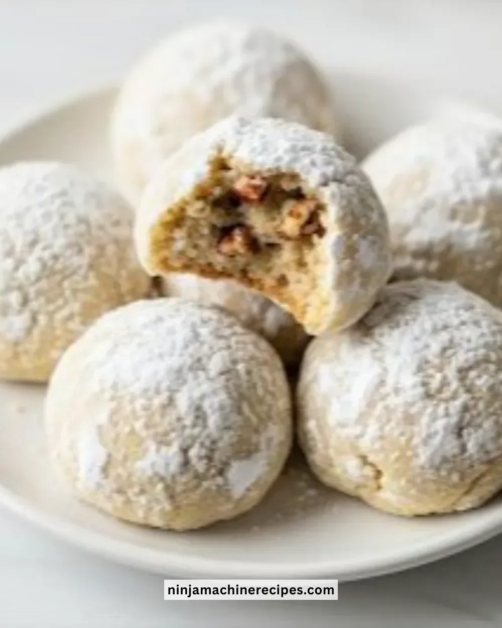 Delicious buttery pecan snowball cookies dusted with powdered sugar