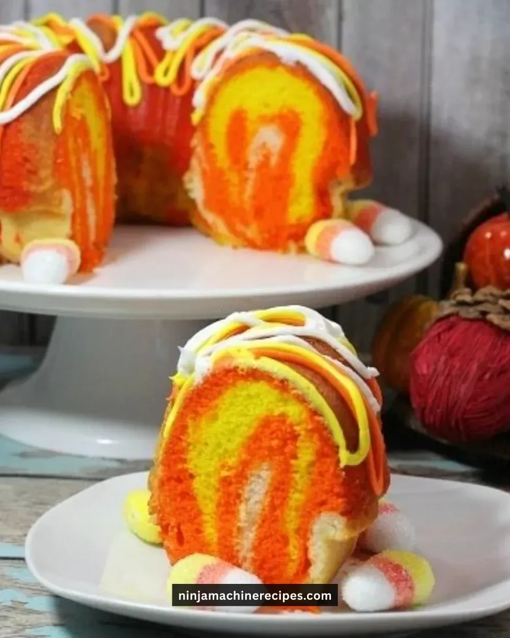 Delicious Candy Corn Bundt Cake decorated for Halloween with vibrant colors