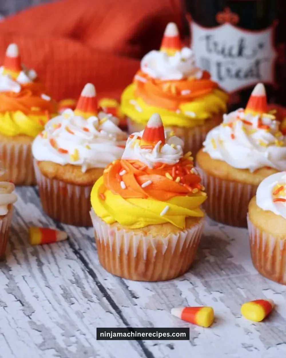 Delicious Candy Corn Funfetti Cupcakes topped with festive frosting and sprinkles