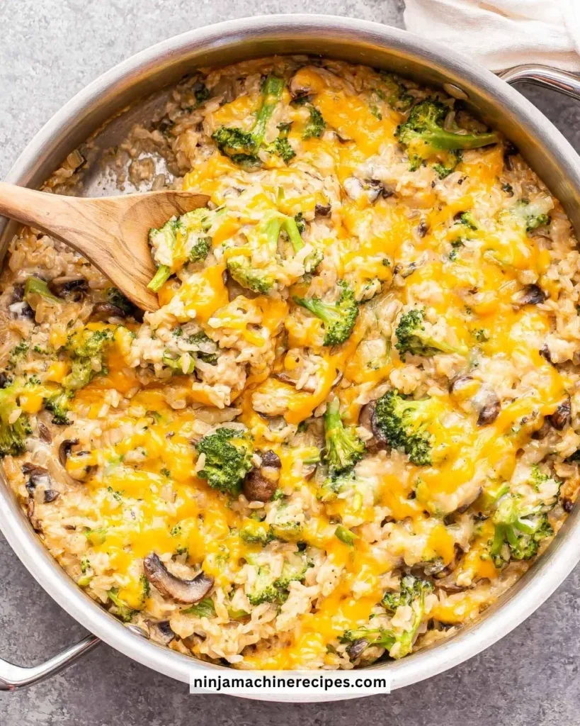 Cheesy broccoli rice casserole baked and garnished with cheese and herbs