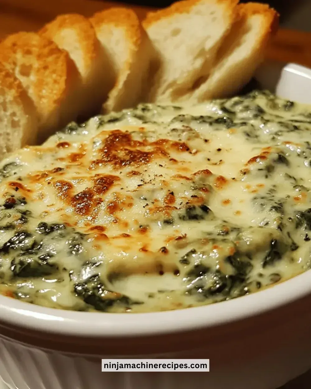 Creamy Cheesy Spinach Dip served with crunchy crackers
