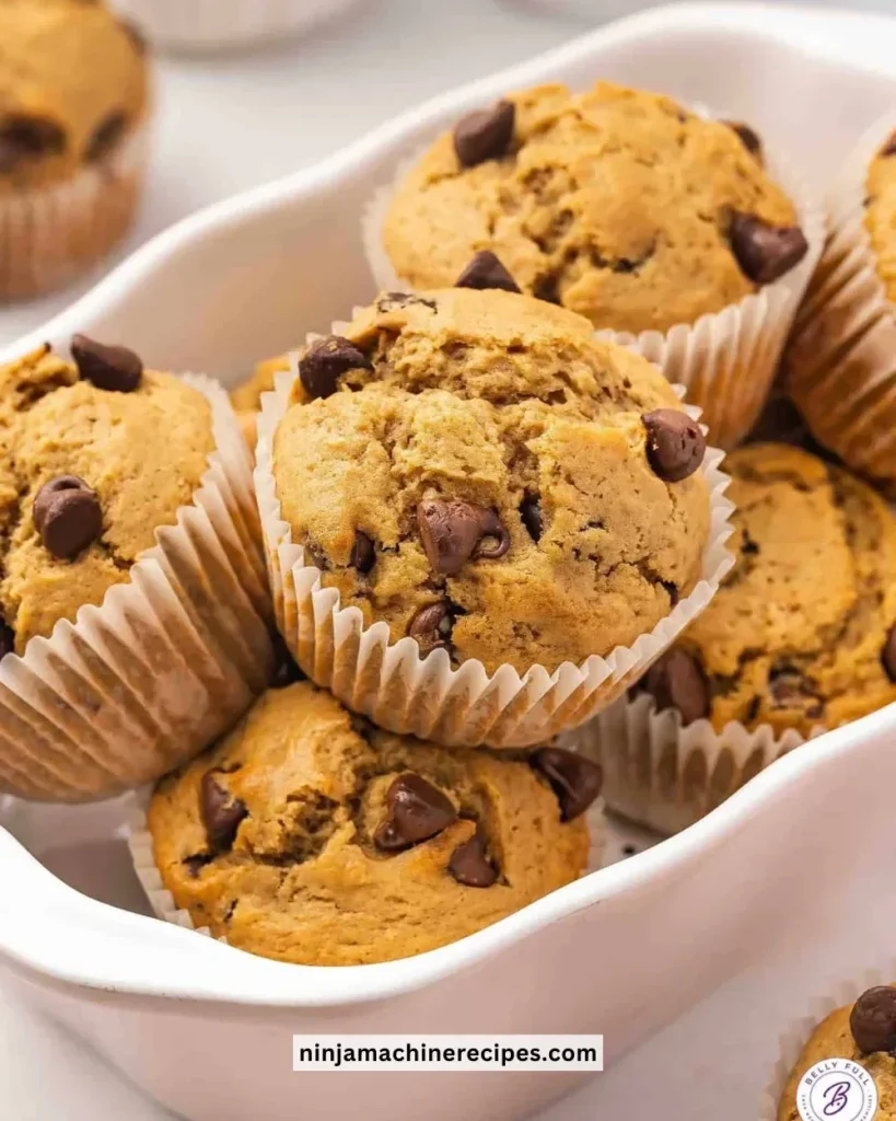 Delicious chocolate chip coffee muffins fresh out of the oven.