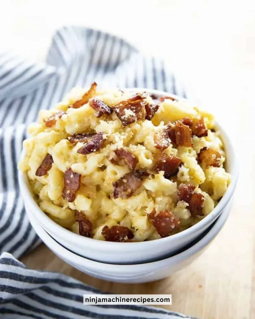 Classic Mac and Cheese with crispy bacon on top, creamy and delicious comfort food.