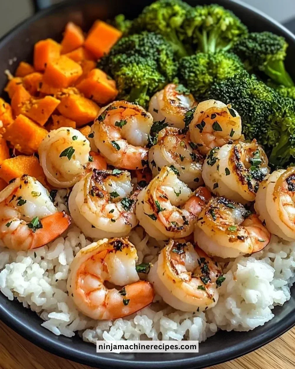 Delicious garlic butter shrimp served with steamed rice and mixed vegetables