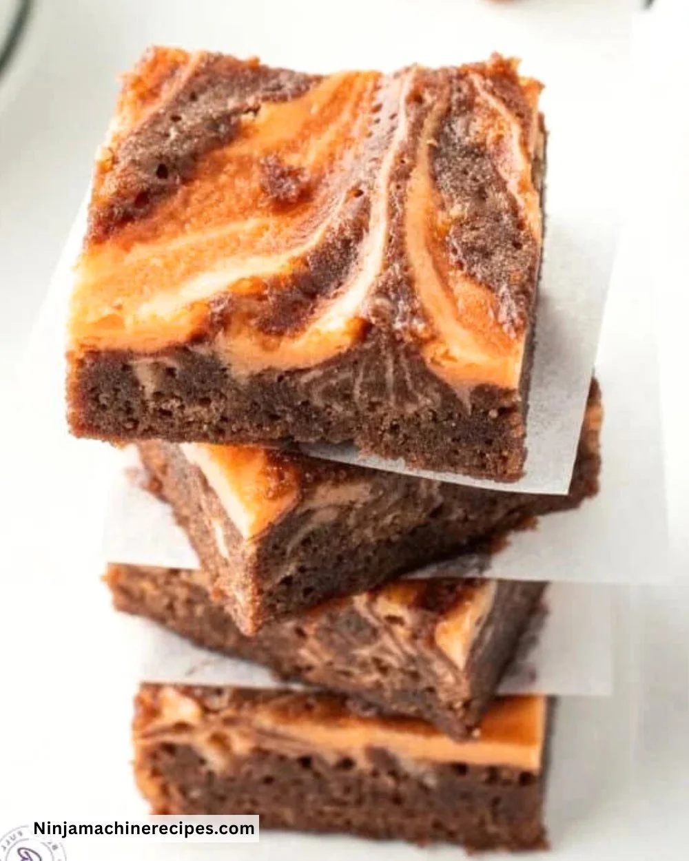 Delicious Halloween brownies with spooky decorations and festive colors.