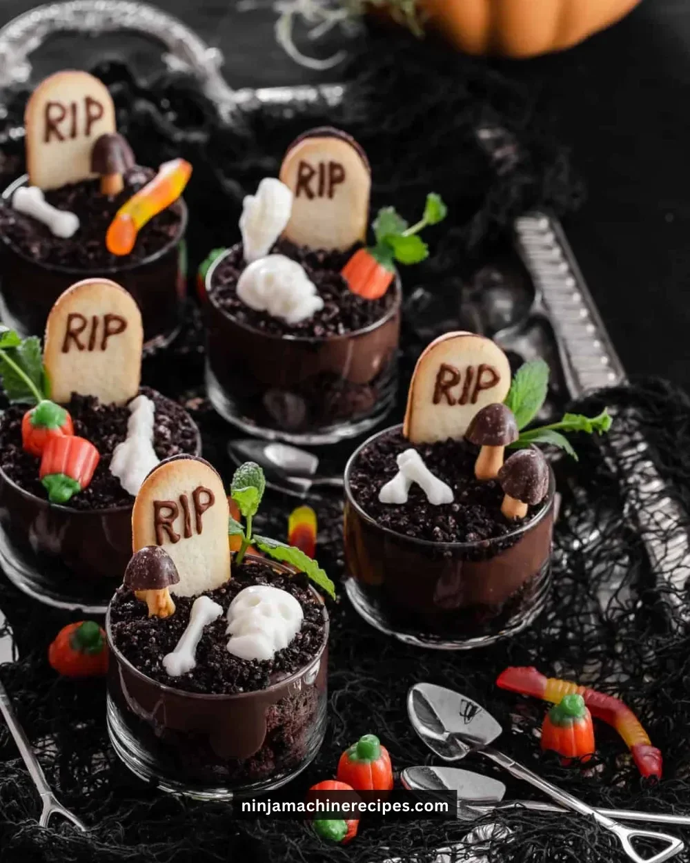 Halloween Dirt Pudding Cups with gummy worms and chocolate crumbles