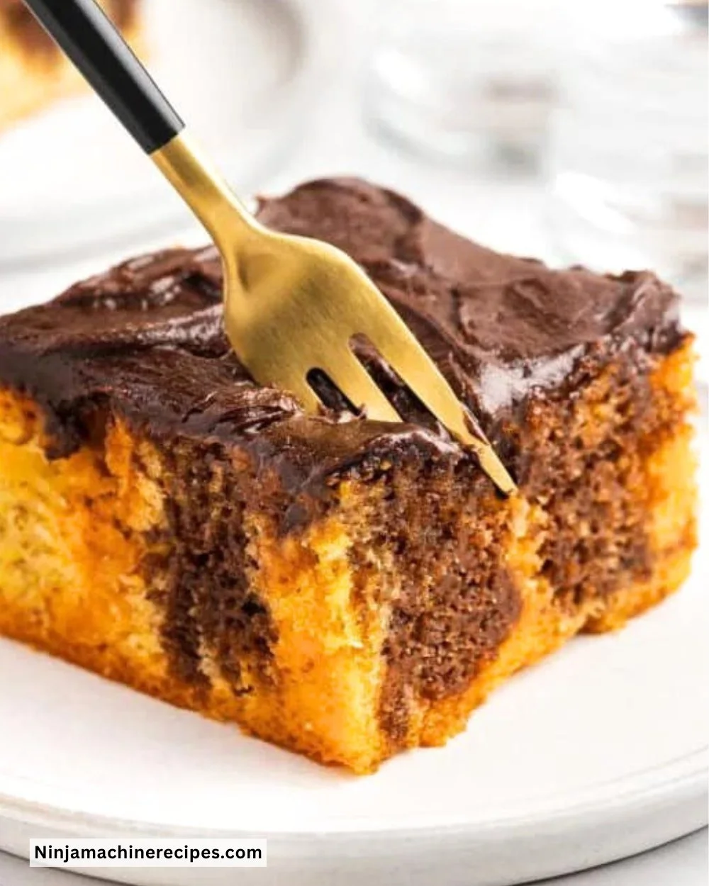 Festive Halloween Poke Cake with colorful toppings and spooky decorations