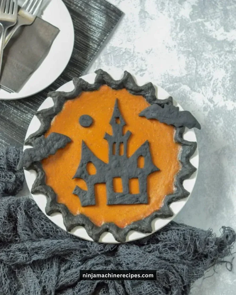Delicious Halloween pumpkin pie with spices and whipped cream
