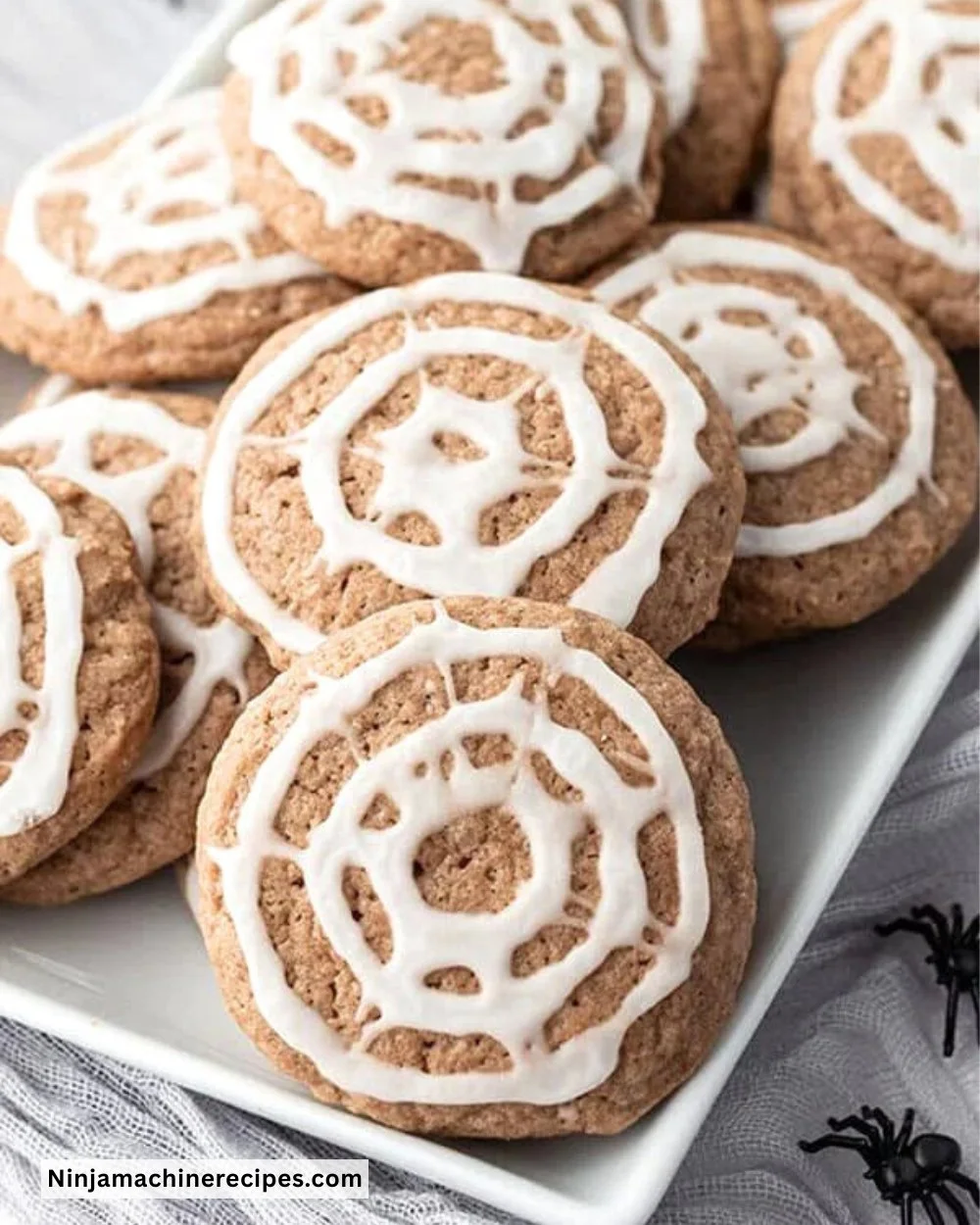 Halloween-themed Spiderweb Chocolate Sugar Cookies decorated for the holiday
