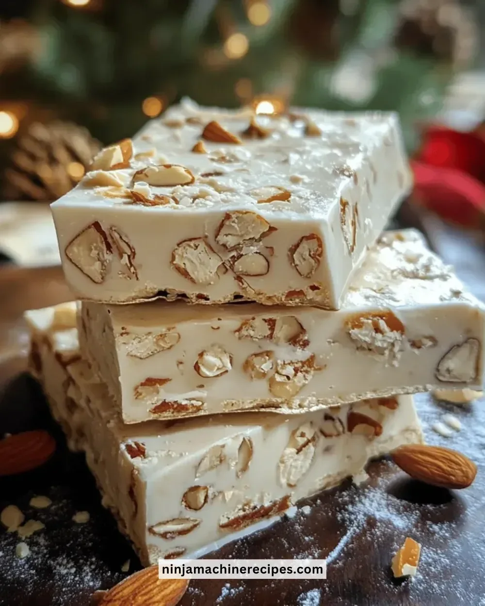 Delicious homemade Christmas nougat with nuts and festive decorations