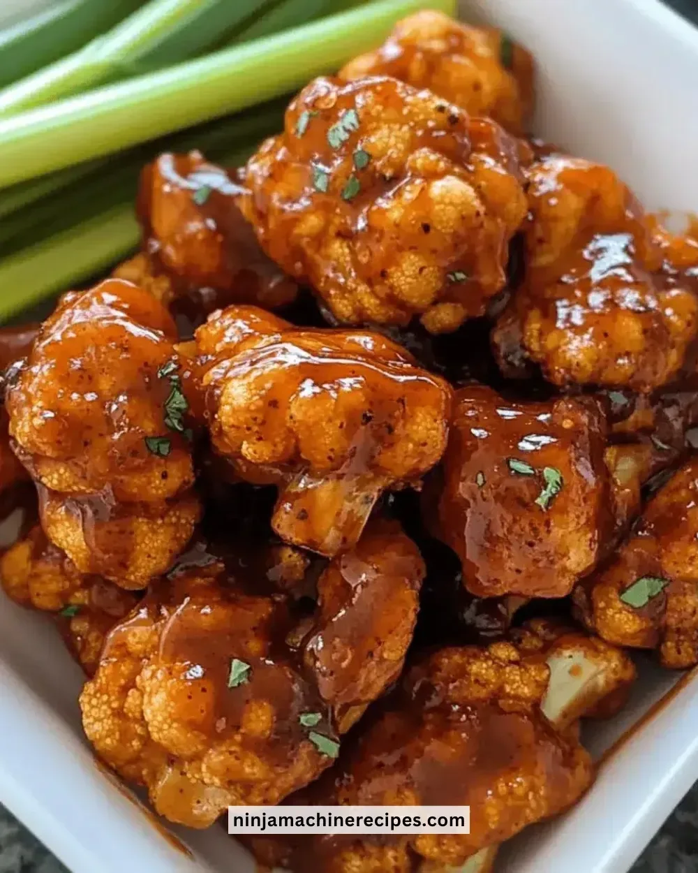 Irresistible Honey BBQ Cauliflower Wings on a plate with garnishes