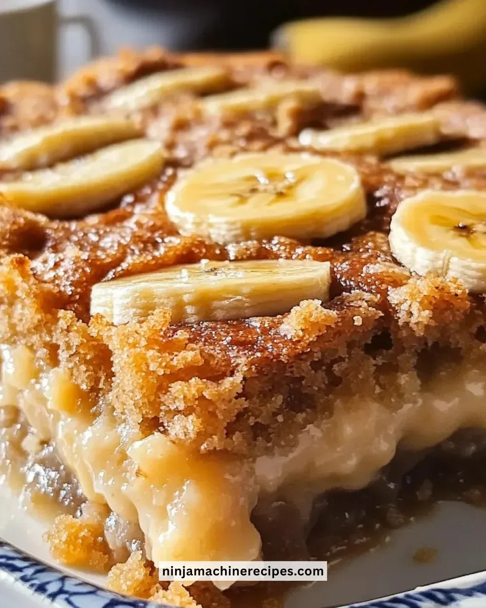 Deliciously moist banana bread cobbler topped with fresh bananas and streusel