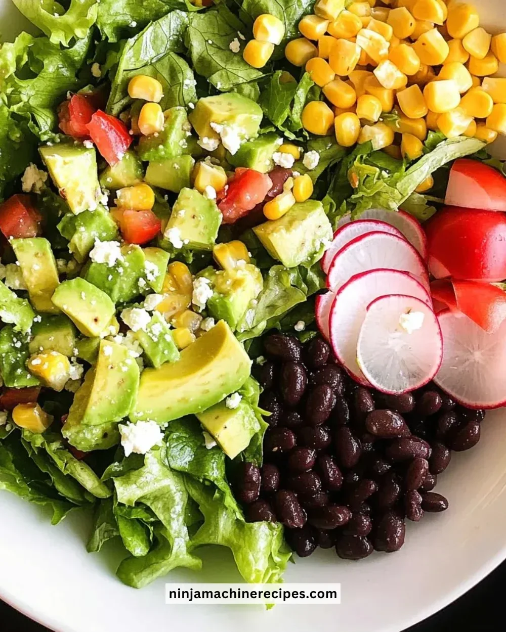 Delicious Mexican Chopped Salad with Honey-Lime Dressing in a colorful bowl