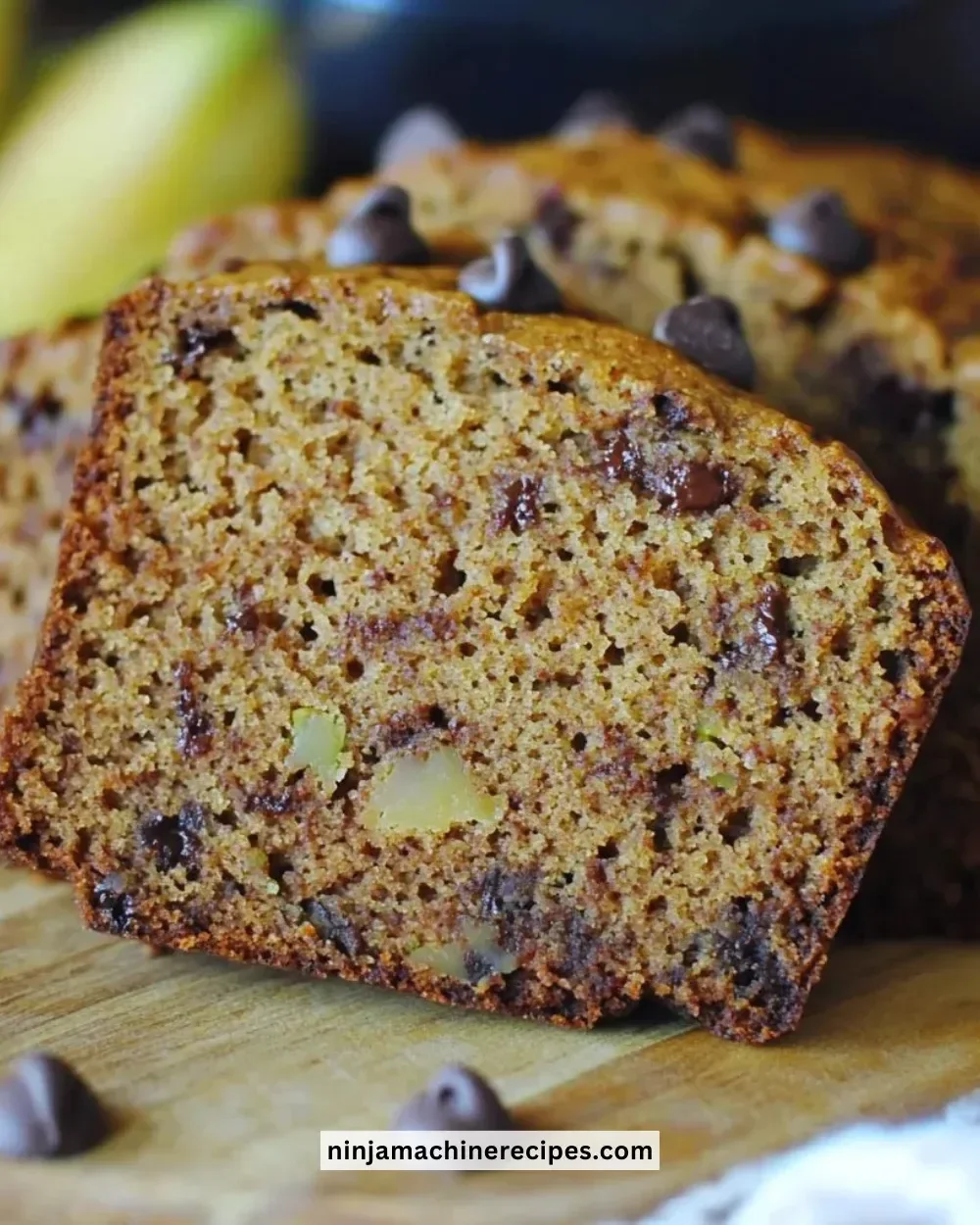 Moist chocolate chip zucchini bread with chocolate chunks and zucchini slices