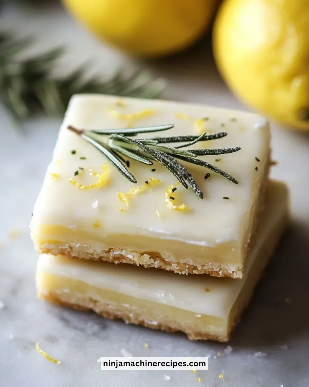 Rosemary-Lemon Shortbread cookies with a salted glaze on a decorative plate