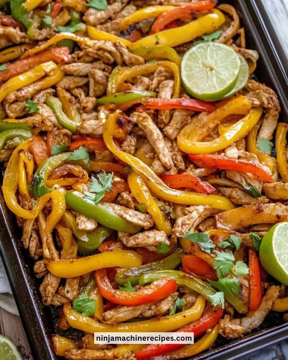 A colorful platter of fajitas served with toppings for a crowd-pleasing meal.