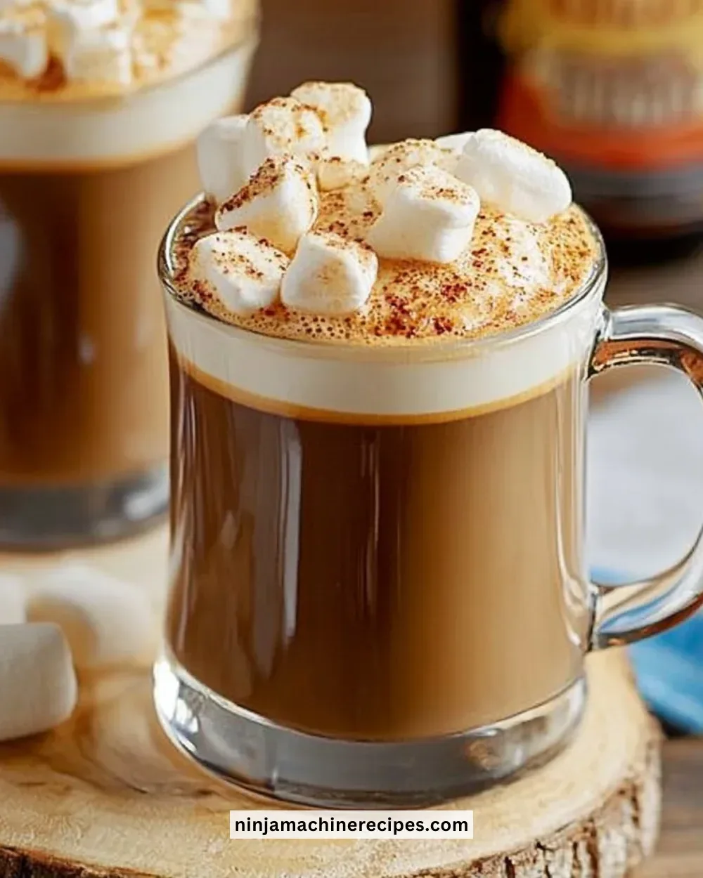 Toasted vegan marshmallows with coffee syrup on a rustic wooden board