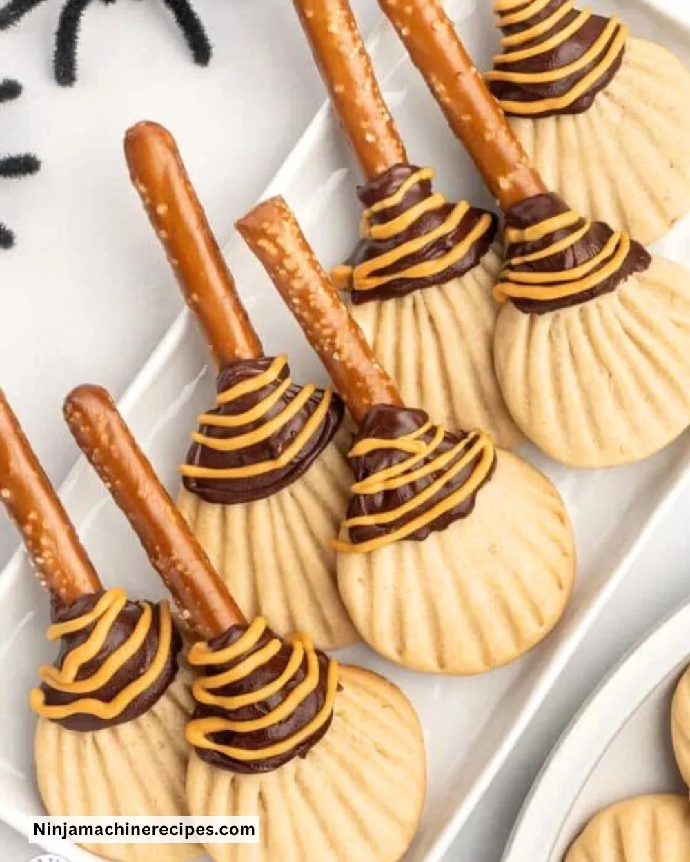 Delicious homemade witches brooms cookies decorated for Halloween