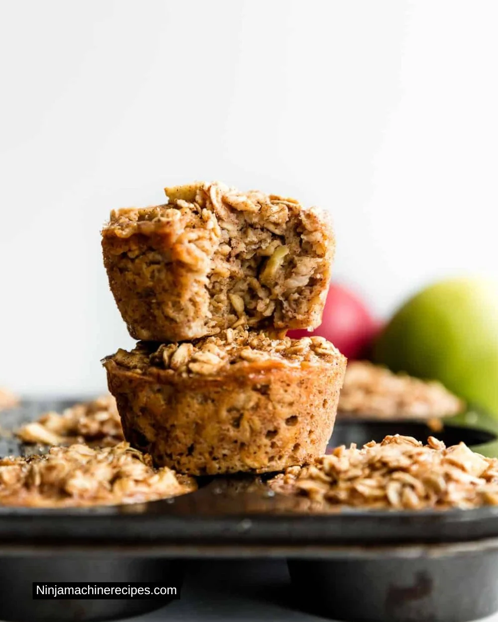 Apple cinnamon baked oatmeal cups in a baking dish