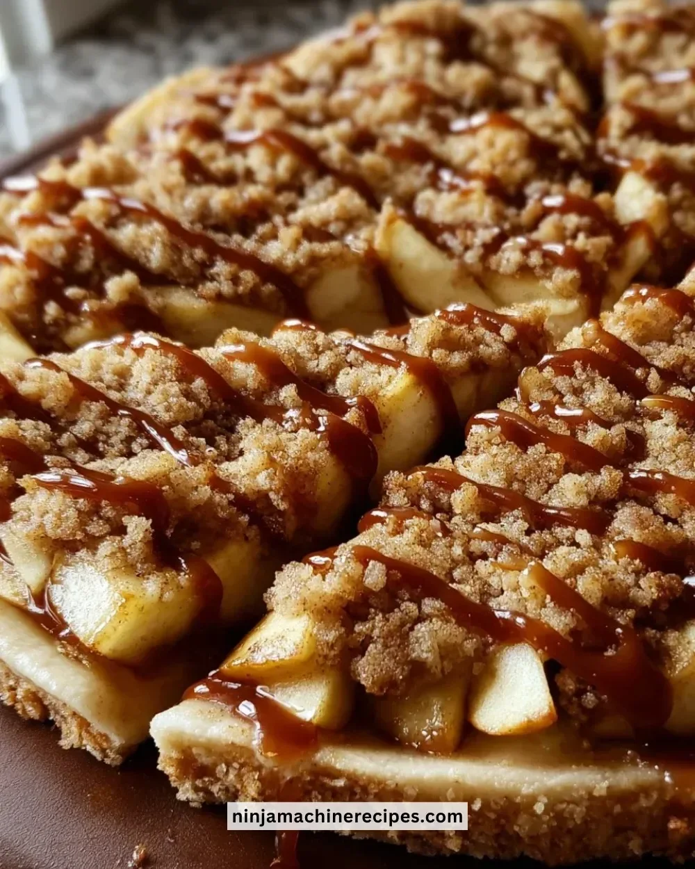 Delicious Apple Crisp Pizza dessert topped with fresh apples and crumble