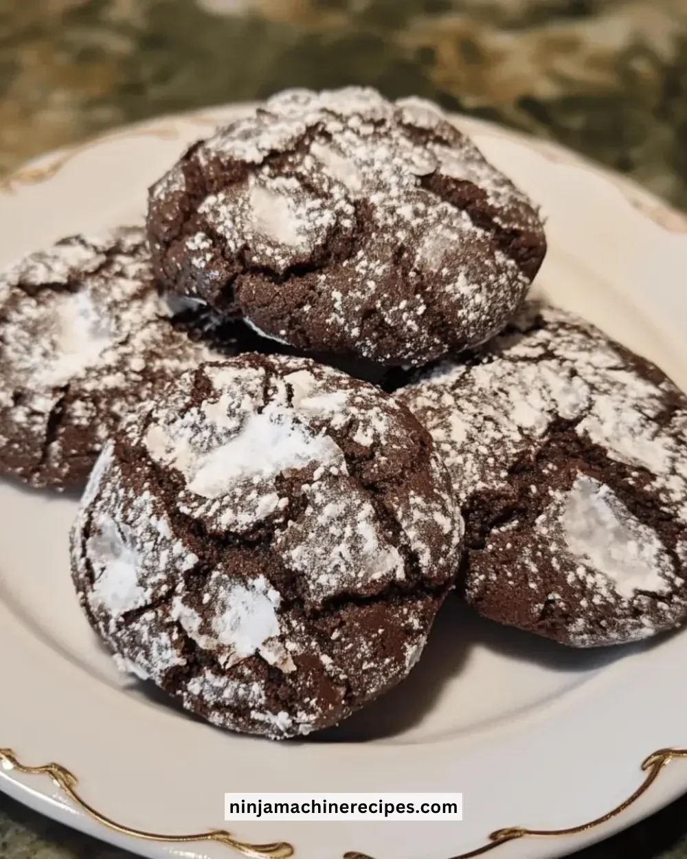 Delicious holiday chocolate crinkle cookies dusted with powdered sugar