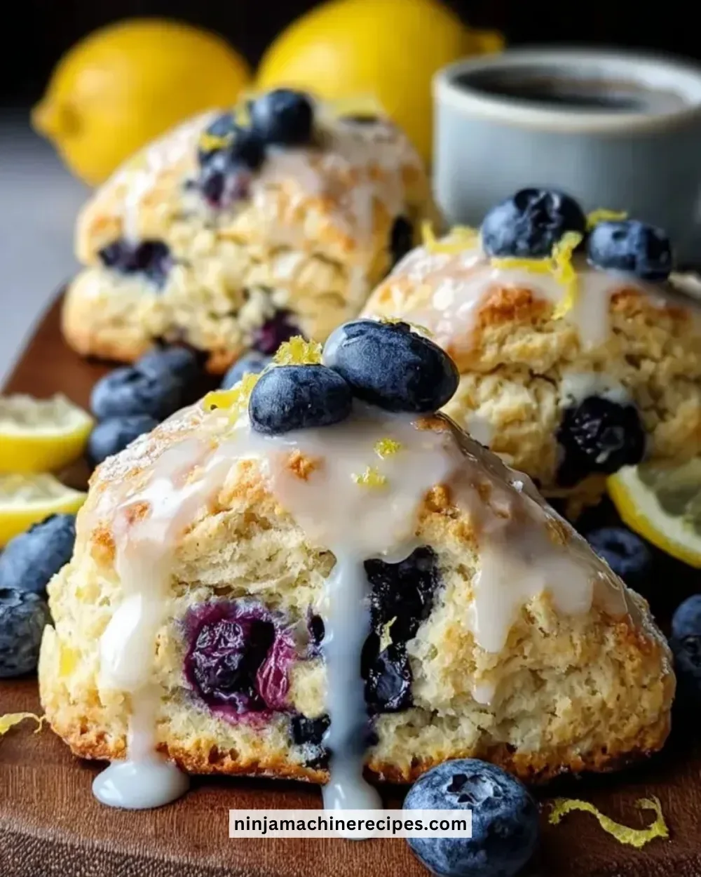 Freshly baked blueberry lemon scones with a golden crust and berries