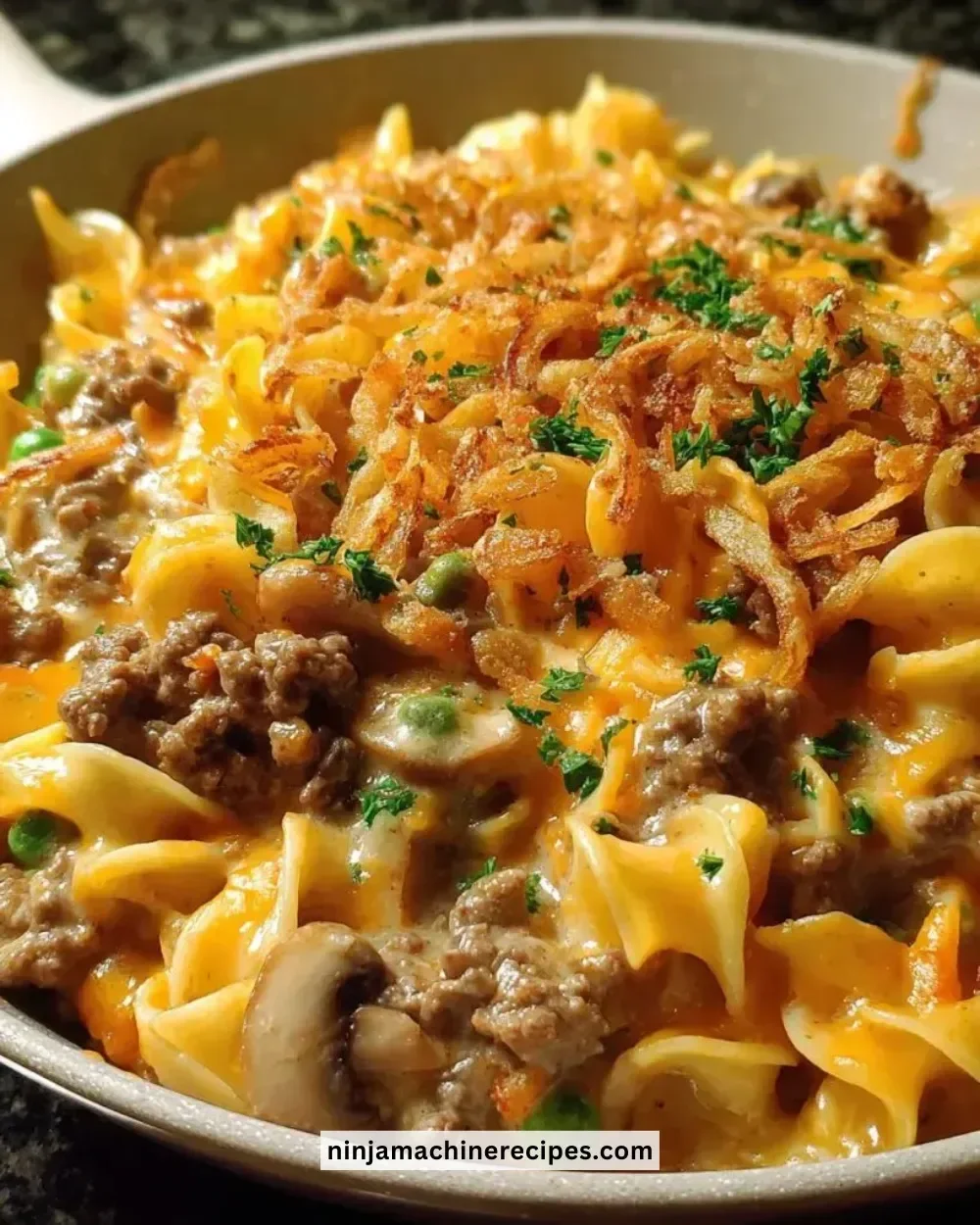 Cheesy Beef Noodle Casserole baked dish with layers of beef, noodles, and cheese