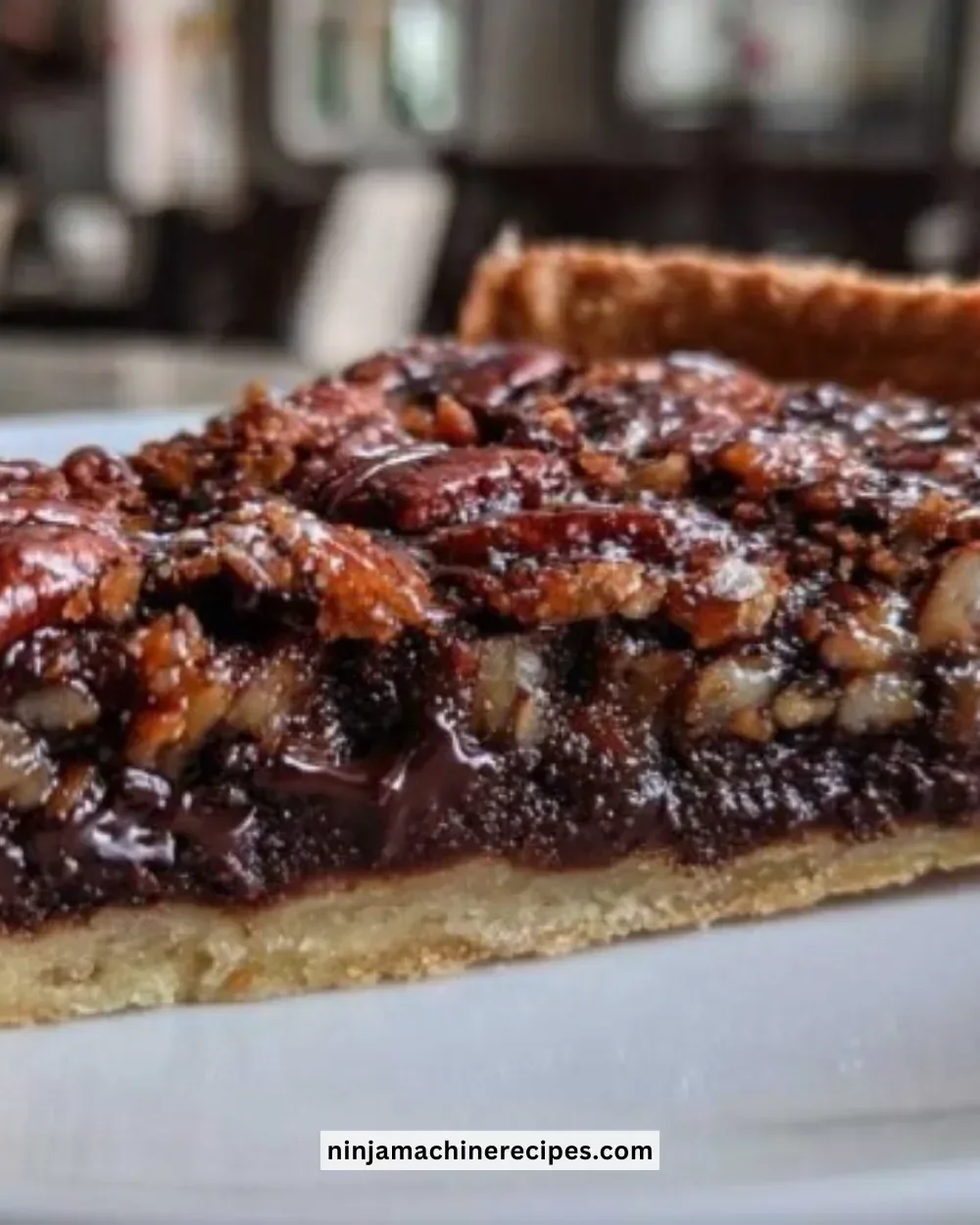 Delicious homemade Chocolate Pecan Tart with rich chocolate and pecans