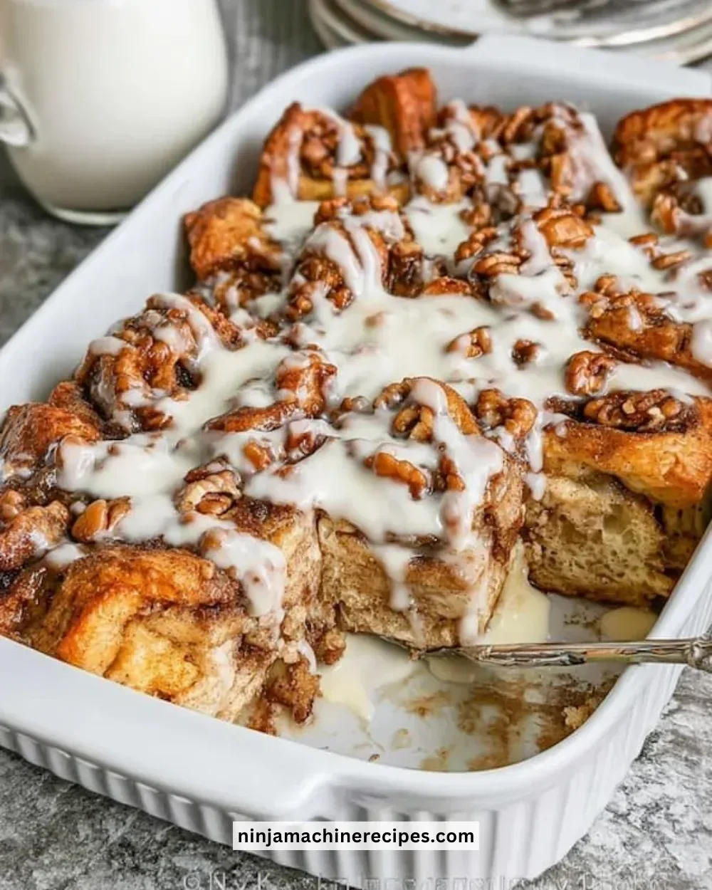 Delicious Cinnamon Roll French Toast casserole topped with icing