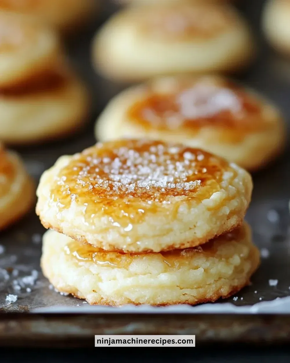 Crème brûlée cookies displayed on a plate, showcasing their caramelized topping.