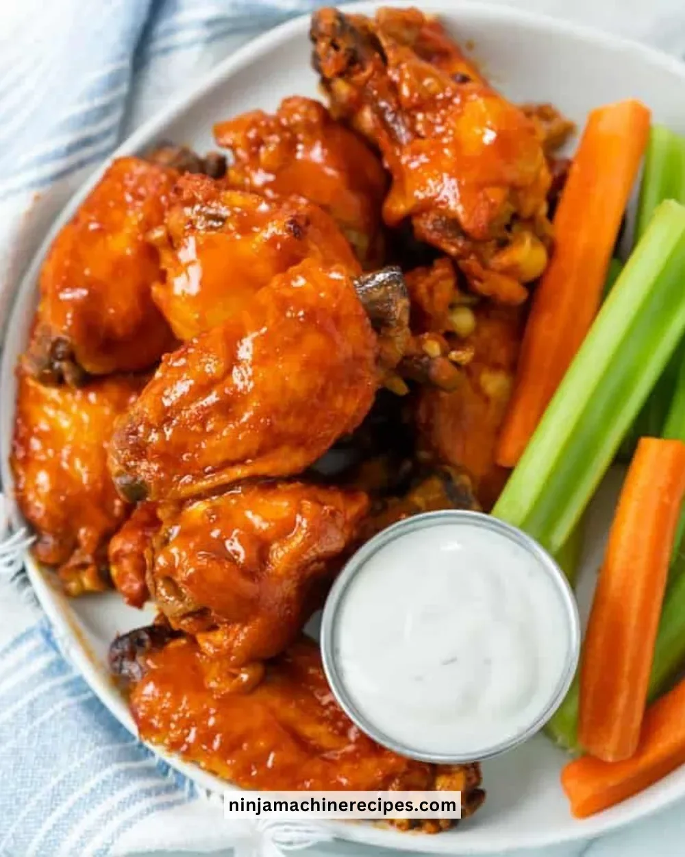 Delicious Crock Pot chicken wings served with dipping sauce