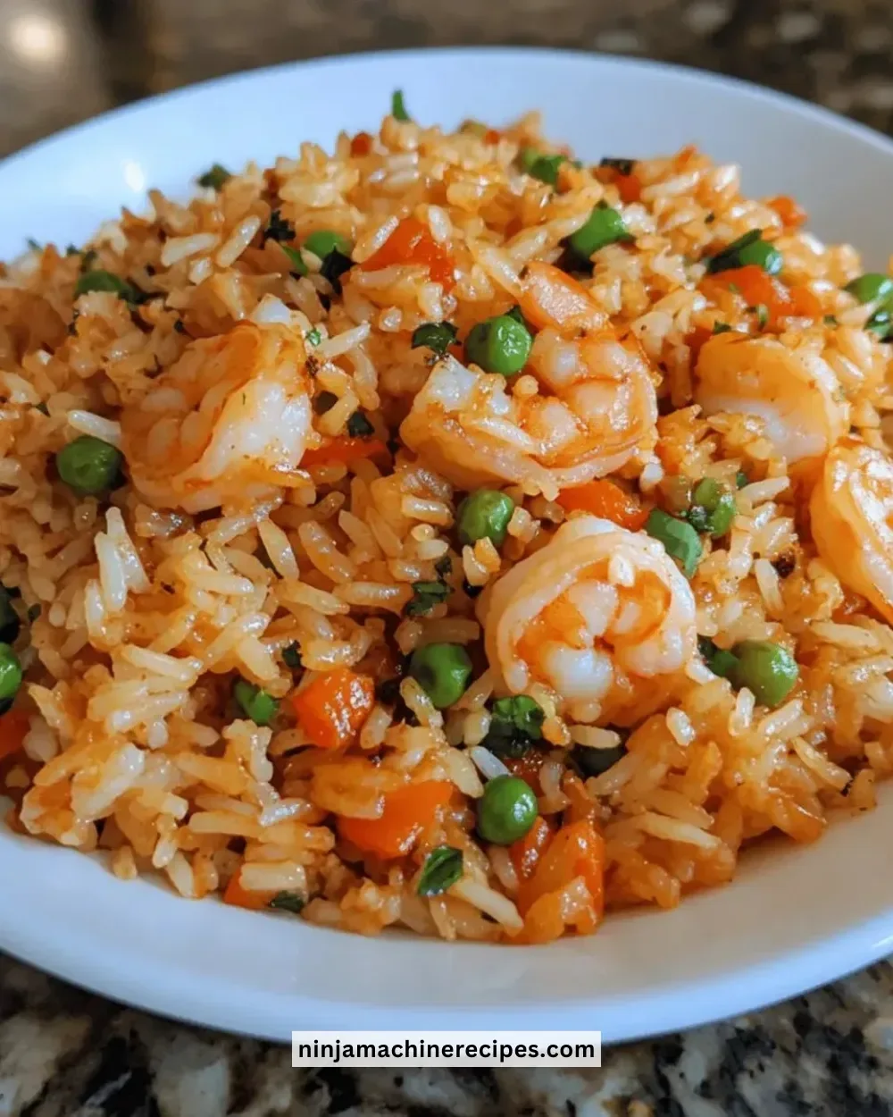 Delicious easy spicy shrimp fried rice served in a bowl with vibrant vegetables