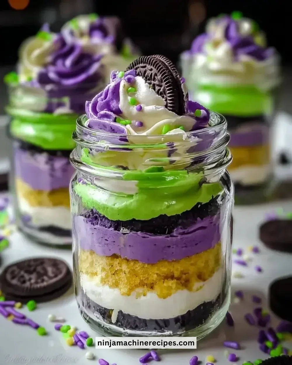 Ghoulishly Fun Beetlejuice Mini Trifles dessert in Halloween-themed jars
