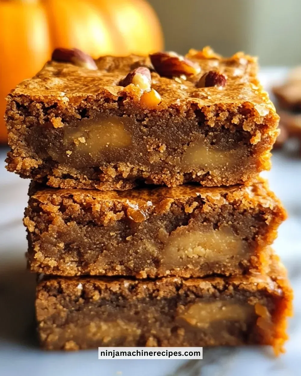 Delicious pumpkin maple blondies cut into squares for a perfect fall treat