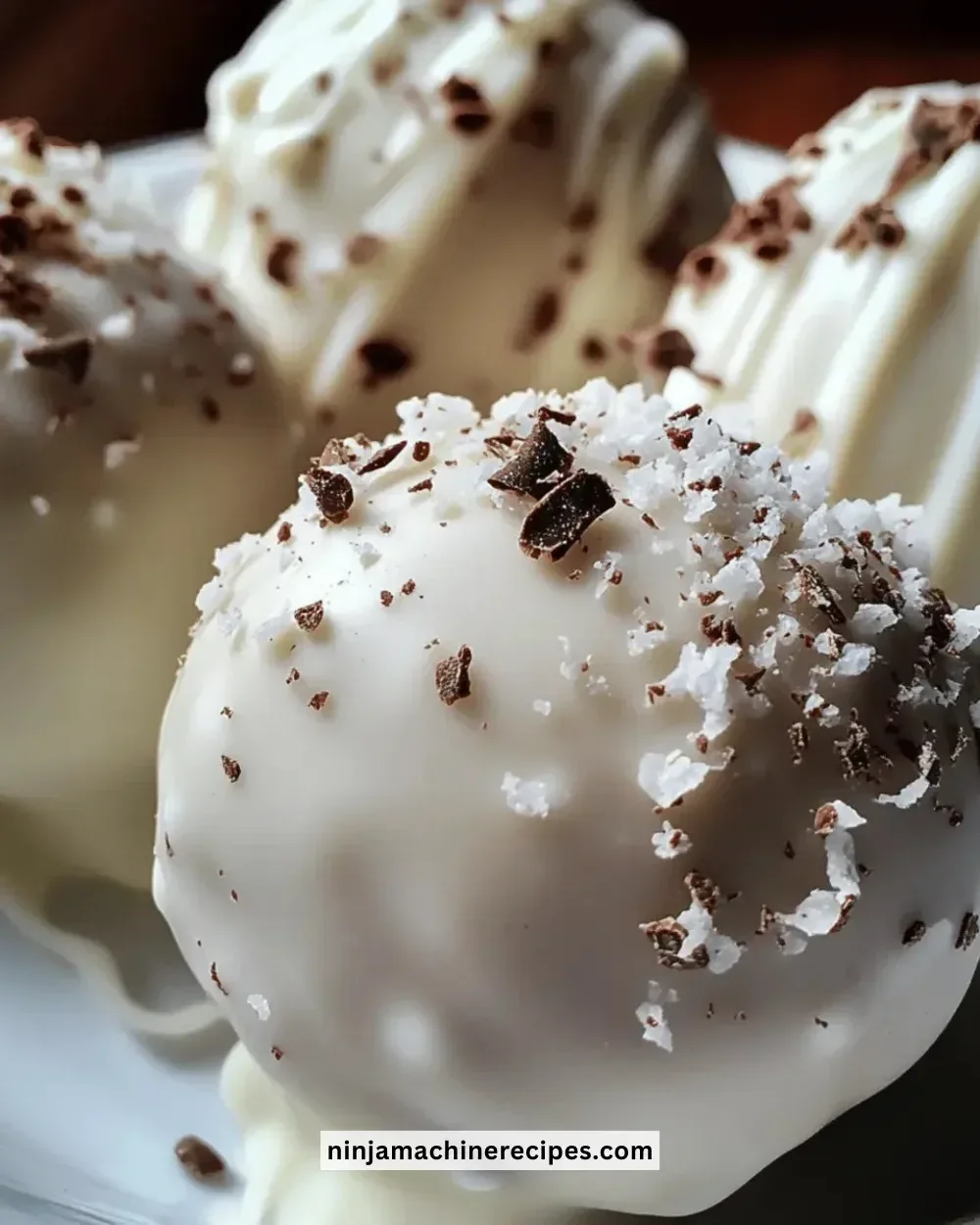 Delicious homemade white chocolate truffle balls arranged on a plate