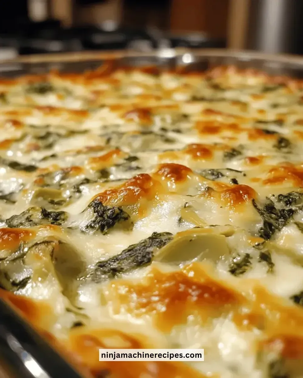Irresistibly cheesy spinach artichoke dip served with tortilla chips