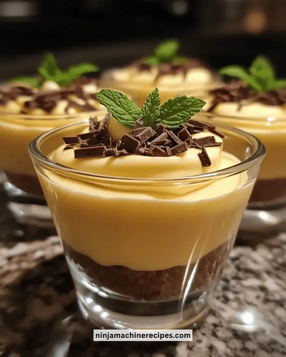 Irresistibly creamy vanilla pudding cups served in elegant dessert glasses.