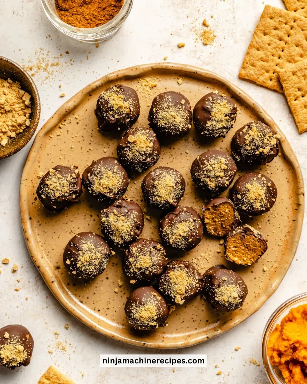 Delicious no-bake pumpkin truffles arranged on a plate