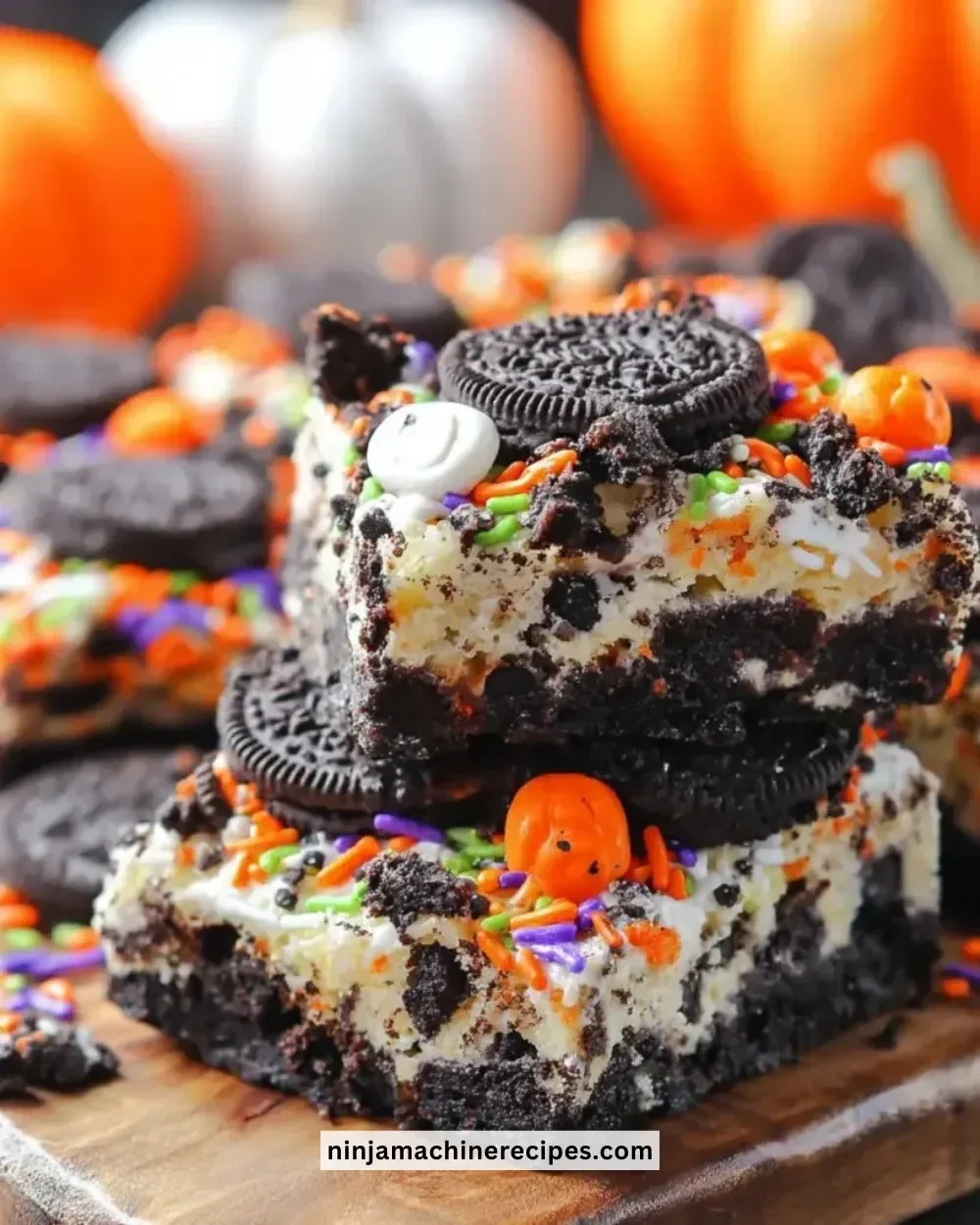 Delicious homemade Oreo Cake Bars topped with creamy frosting and cookie crumbles.
