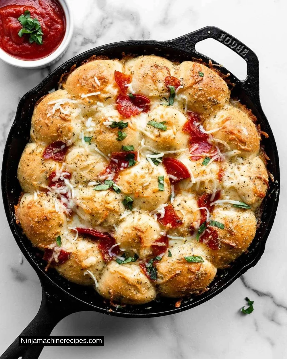 Cheesy Pizza Pull Apart Rolls served with marinara sauce