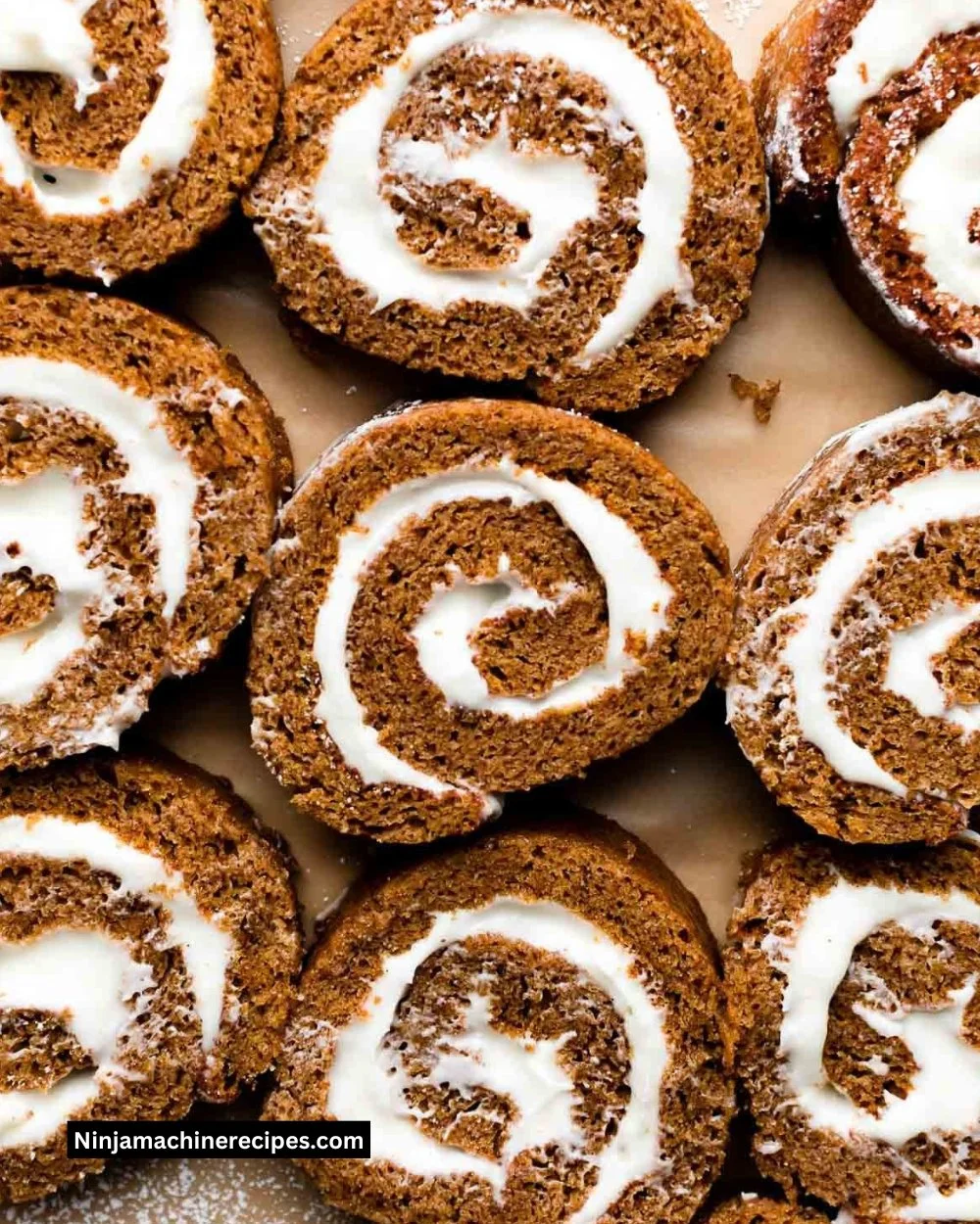 Delicious homemade pumpkin roll dessert with cream cheese filling.