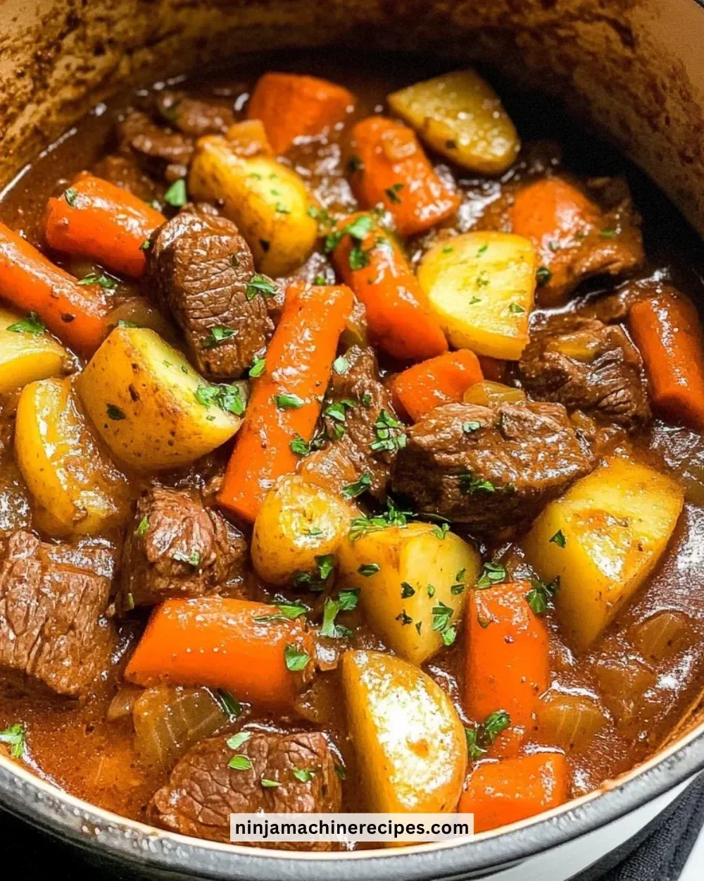 Delicious stove top beef stew simmering in a pot