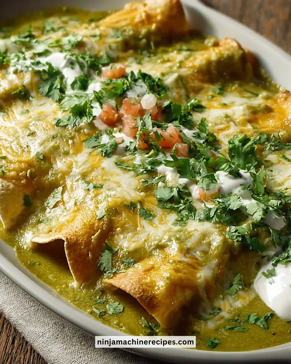 Delicious Swiss Enchiladas topped with cheese and flavorful sauce.